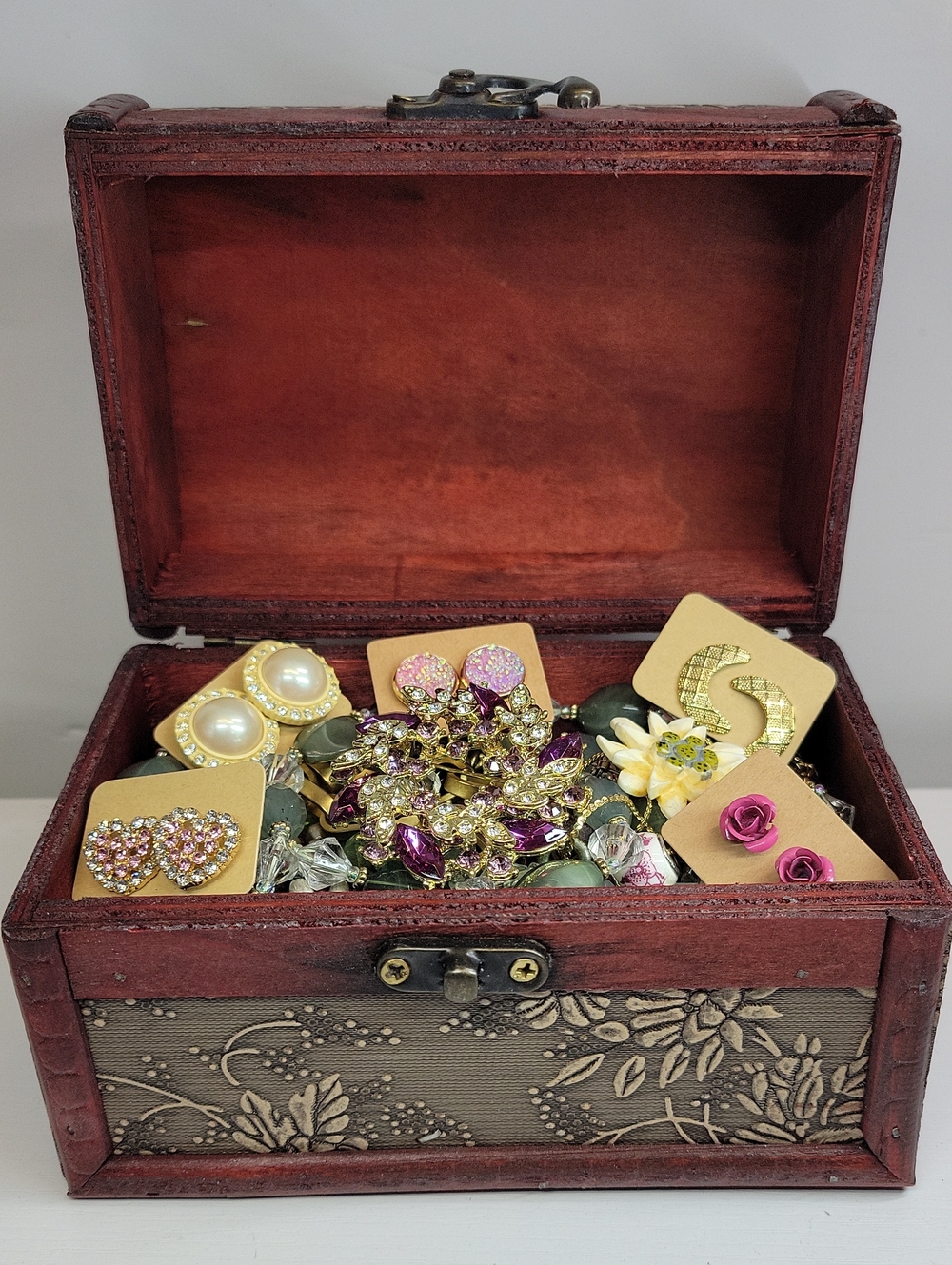 Wooden Chest Filled With Jewelry